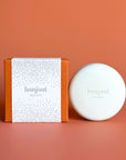 Bonjout Beauty's Le Balm Product next to Holiday Packaging