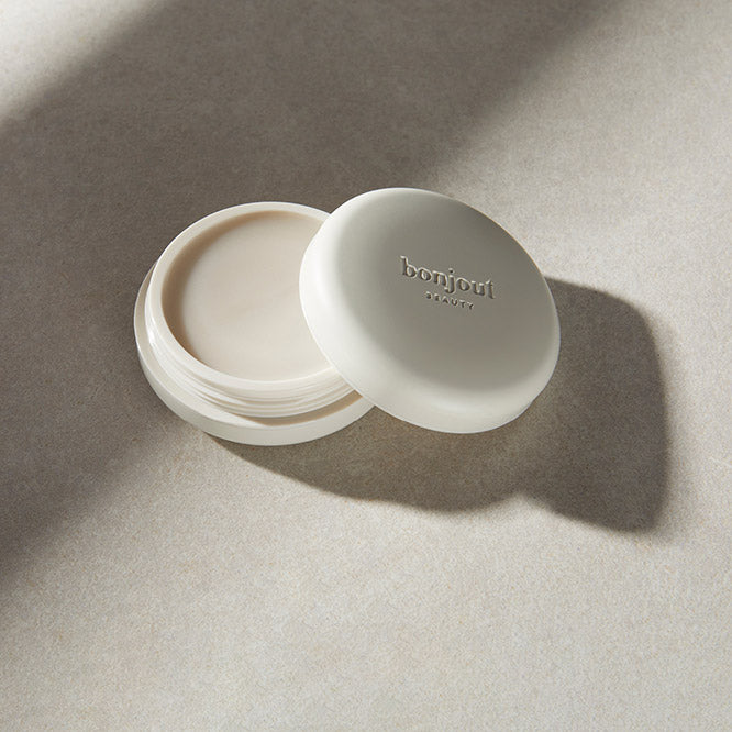 Bonjout Beauty's Le Balm product on gray background