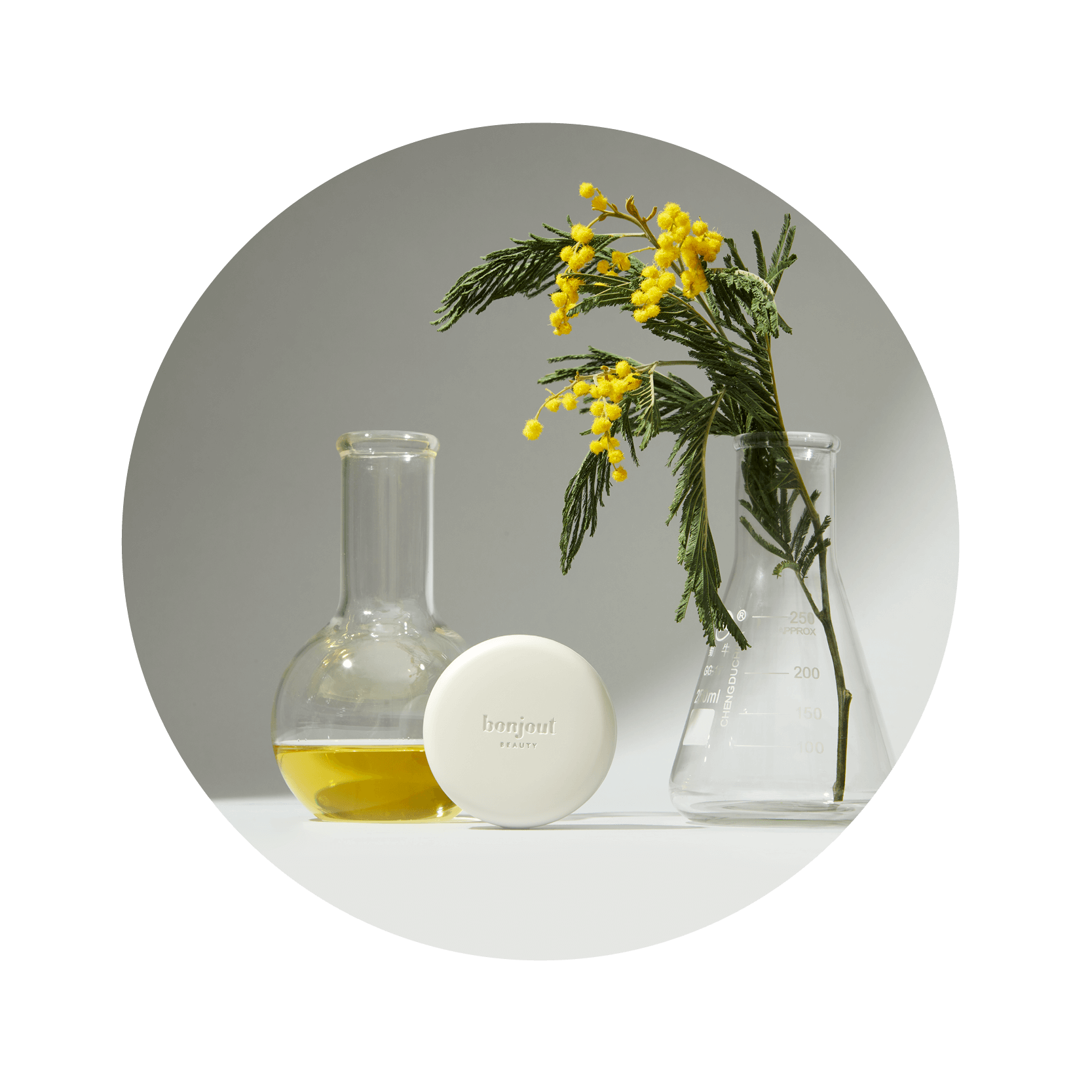 Bonjout Beauty With Le Balm Product & Beakers in the Laboratory
